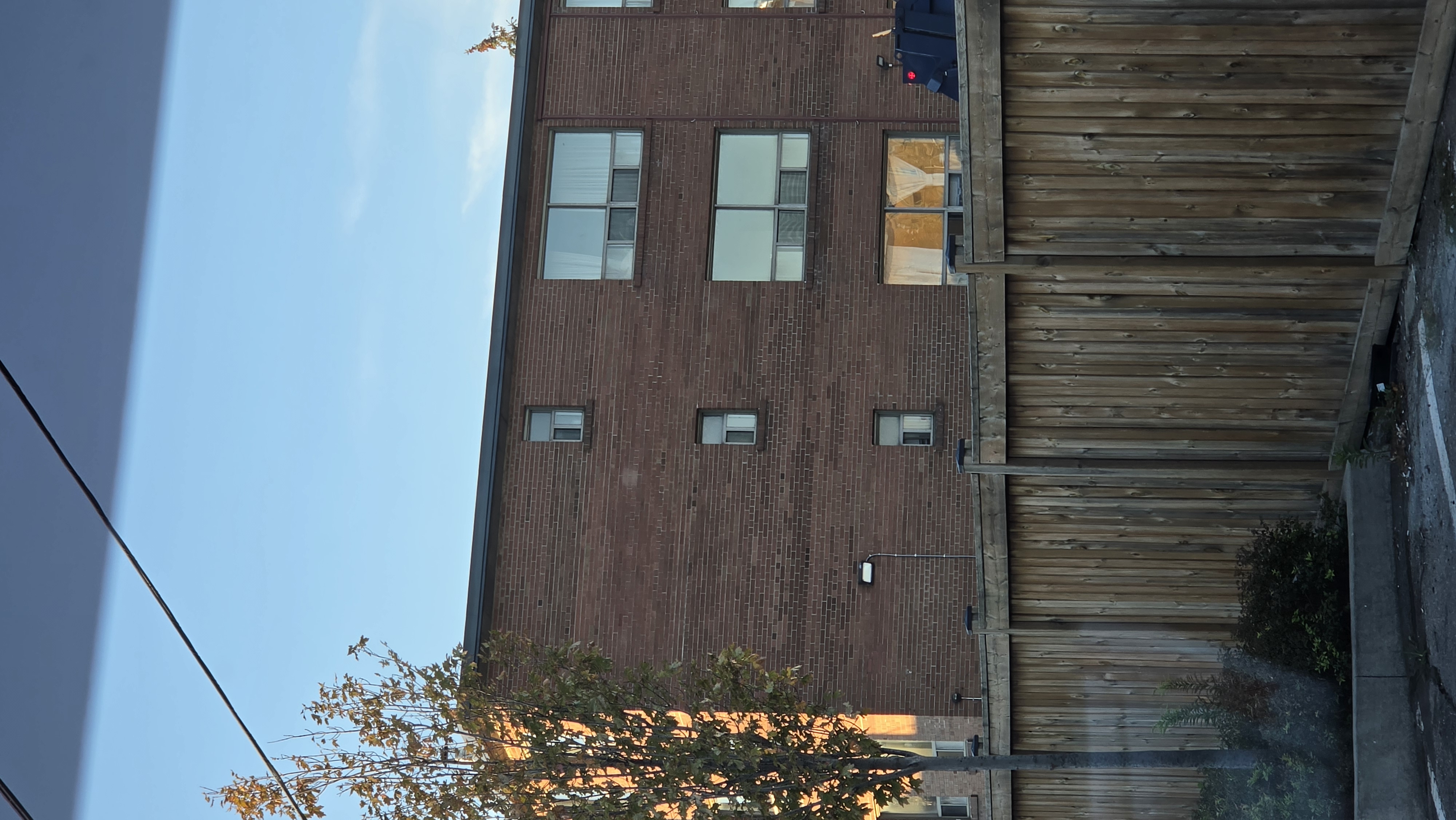 Rear side of a residential flat roof building in toronto.